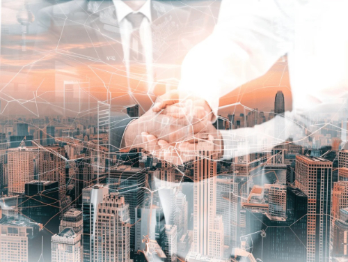 Aerial view of goods warehouse. Logistics center in industrial city zone from above. Aerial view of trucks loading at logistic center